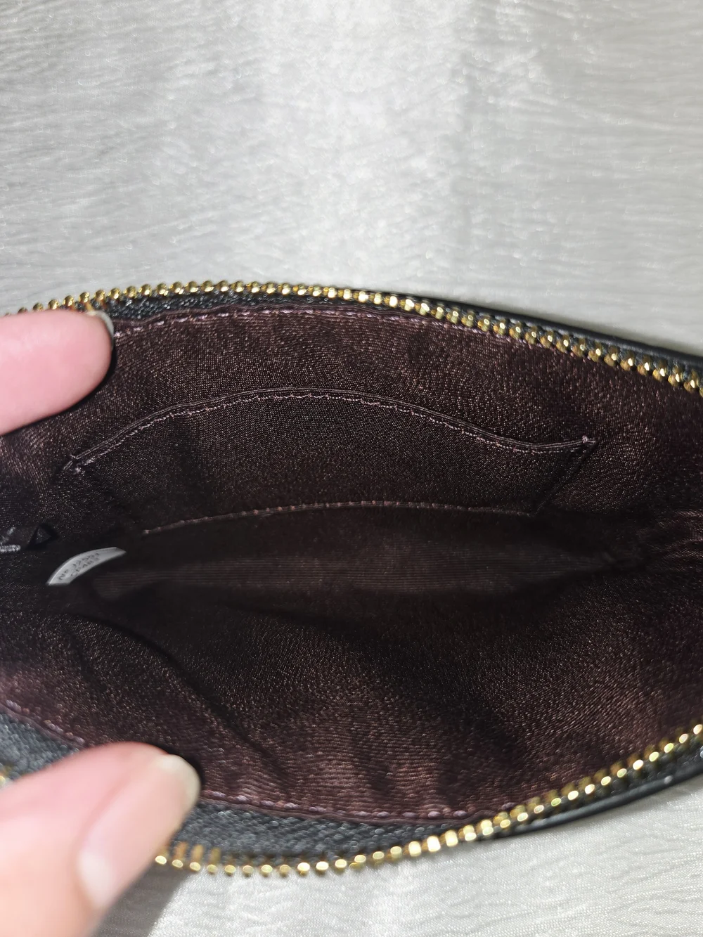Coach Black Pebbled Leather Wristlet with Gold Logo